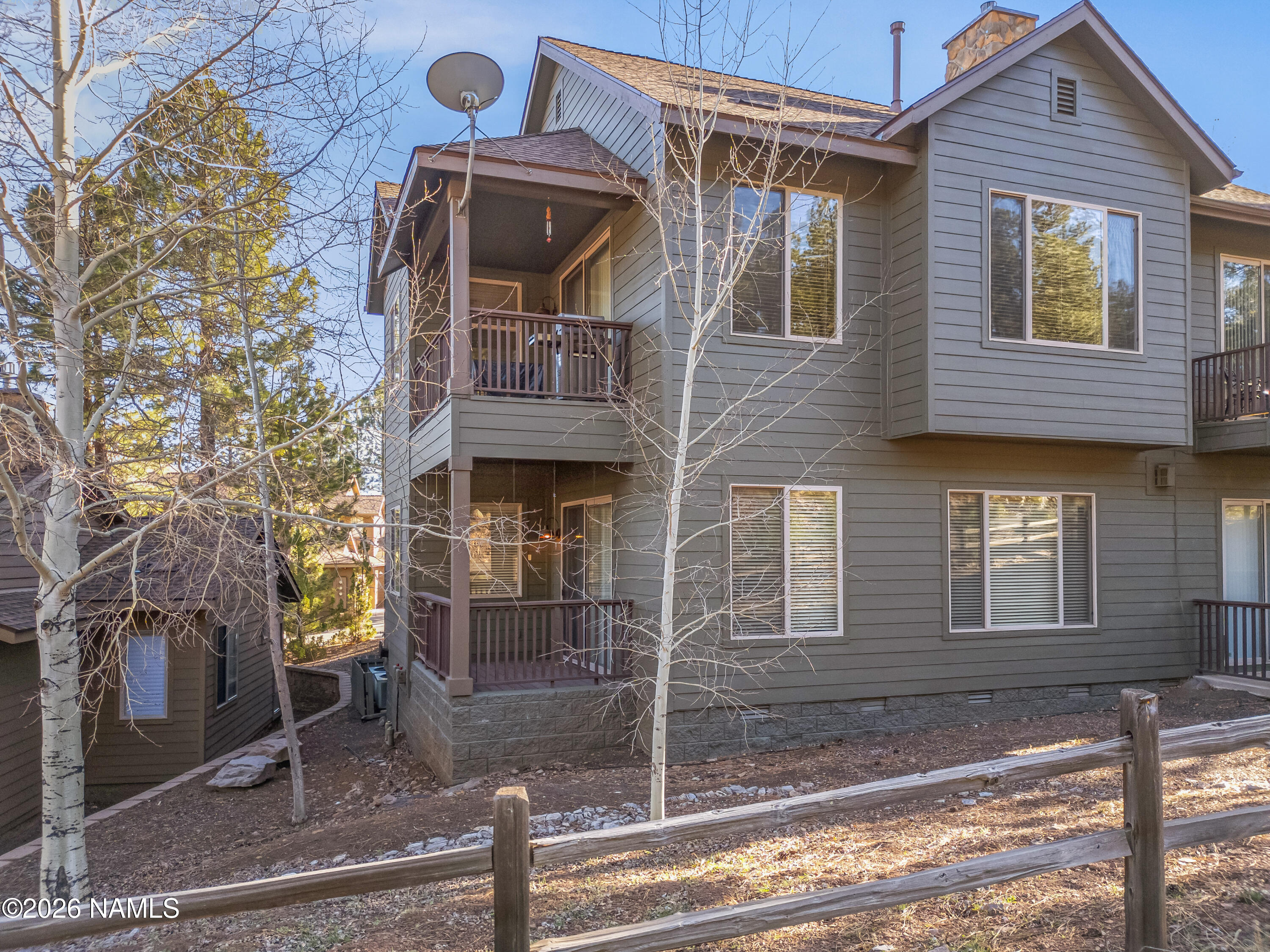 4860 West Quick Draw Flagstaff, AZ 86005 - Photo 27 of 32 a front view of a house with plants
