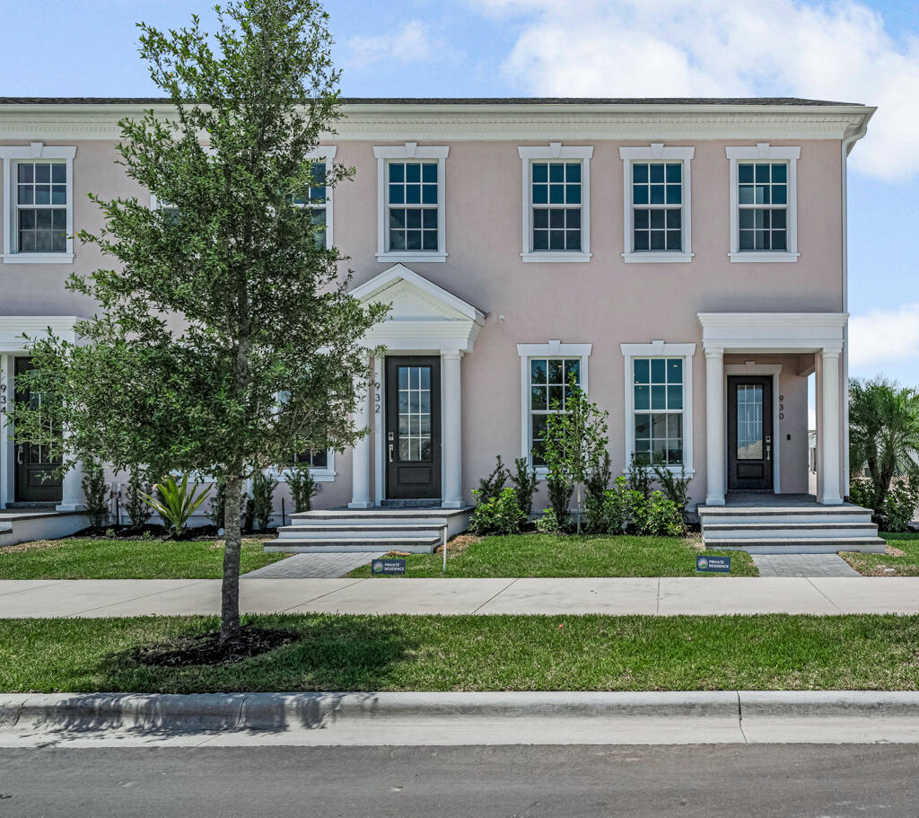 930 Southwest Pr Avenue Palm City, FL 34990 - Photo 1 of 66 a front view of a house with plants