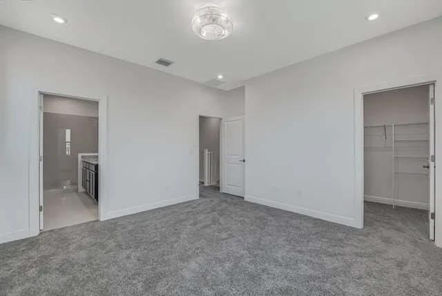 a bathroom with a granite countertop sink mirror and double