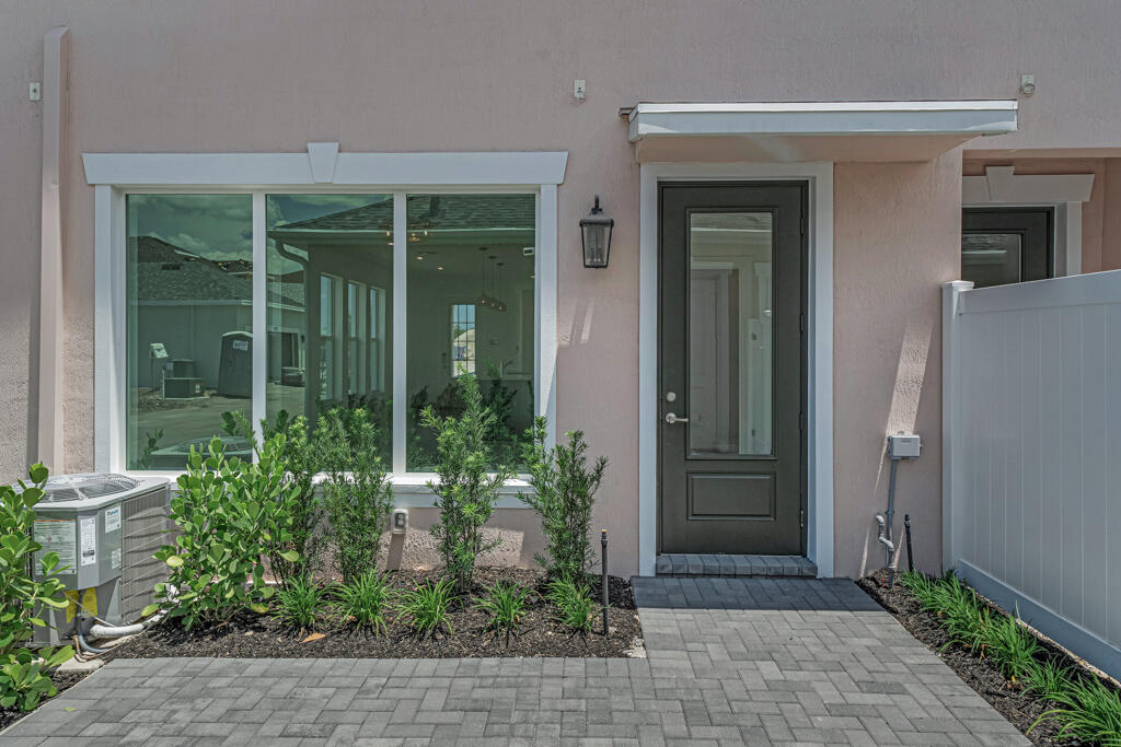 930 Southwest Pr Avenue Palm City, FL 34990 - Photo 35 of 66 a view of entrance gate of the house