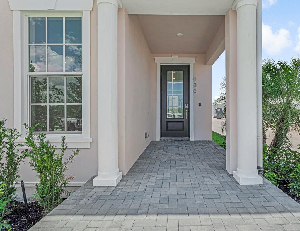 930 Southwest Pr Avenue Palm City, FL 34990 - Photo 4 of 66 a view of house with front door