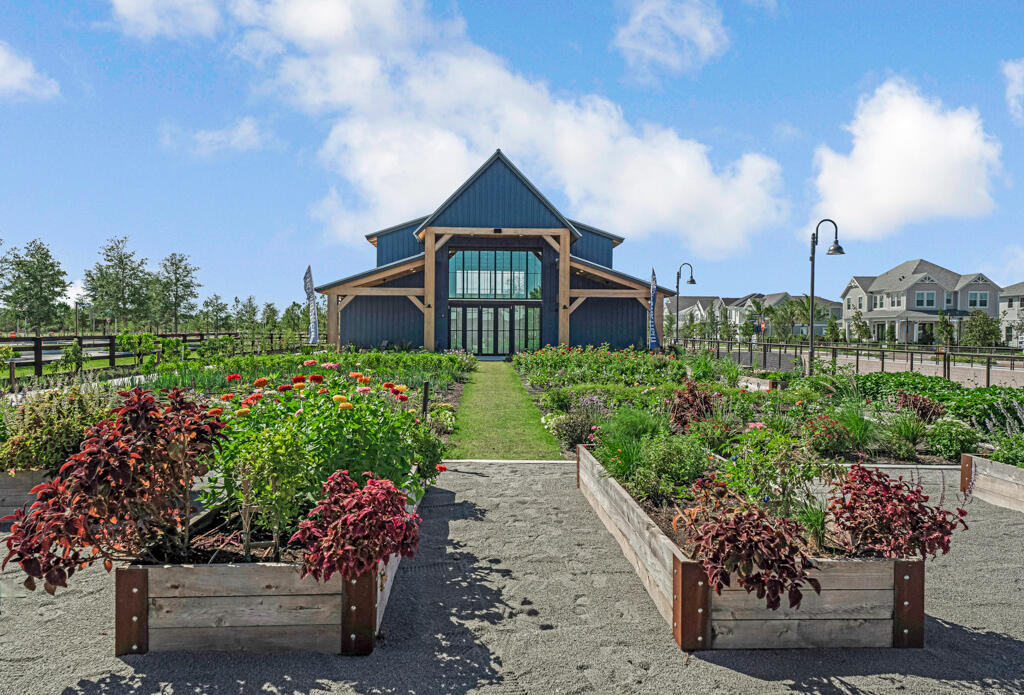 930 Southwest Pr Avenue Palm City, FL 34990 - Photo 43 of 66 a view of a chair and table in the garden