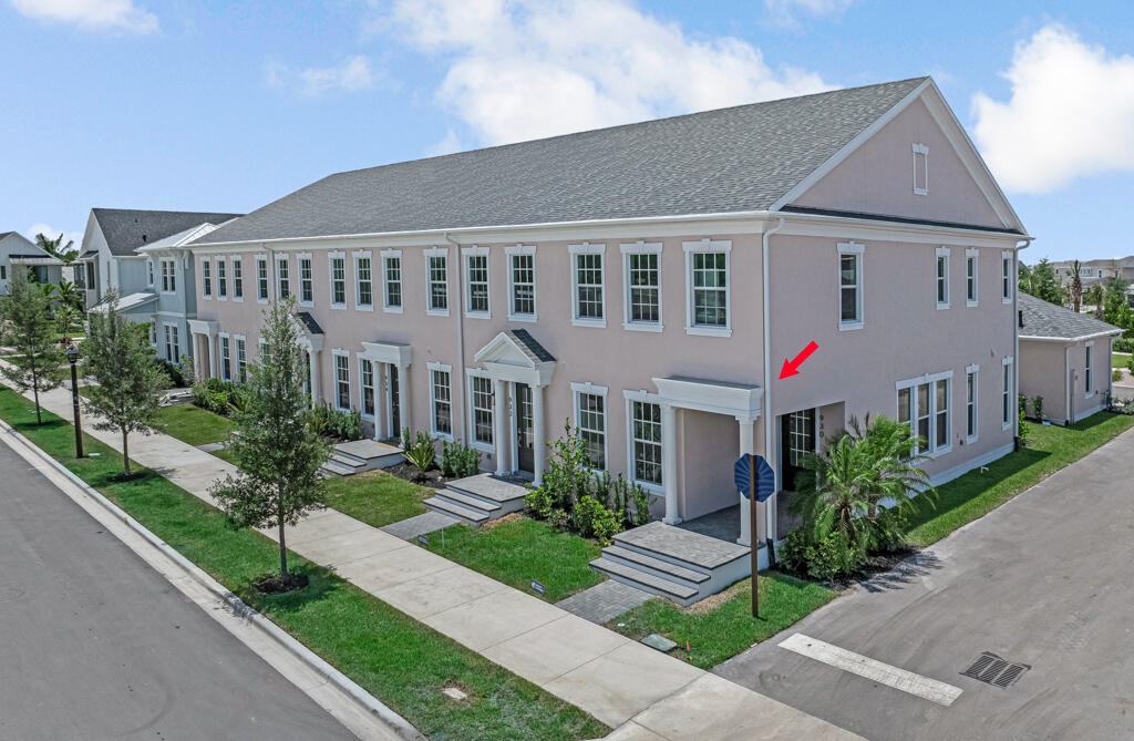 930 Southwest Pr Avenue Palm City, FL 34990 - Photo 48 of 66 a front view of a house with a garden