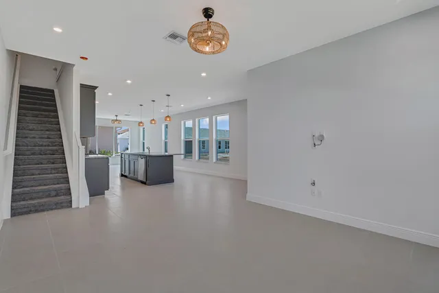 a view of a kitchen with furniture and a kitchen view