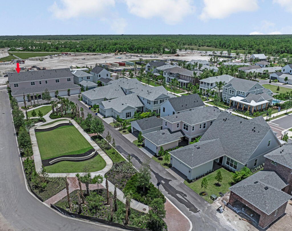 930 Southwest Pr Avenue Palm City, FL 34990 - Photo 66 of 66 an aerial view of a house with a swimming pool