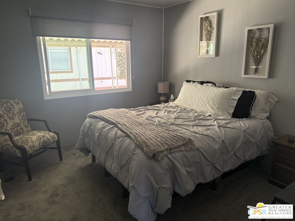15500 Bubbling Wells Road, Unit 286 Desert Hot Springs, CA 92240 - Photo 20 of 50 a bedroom with bed and window
