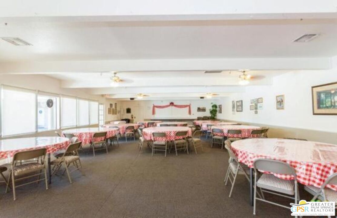 15500 Bubbling Wells Road, Unit 286 Desert Hot Springs, CA 92240 - Photo 41 of 50 a group of people sitting in a living room