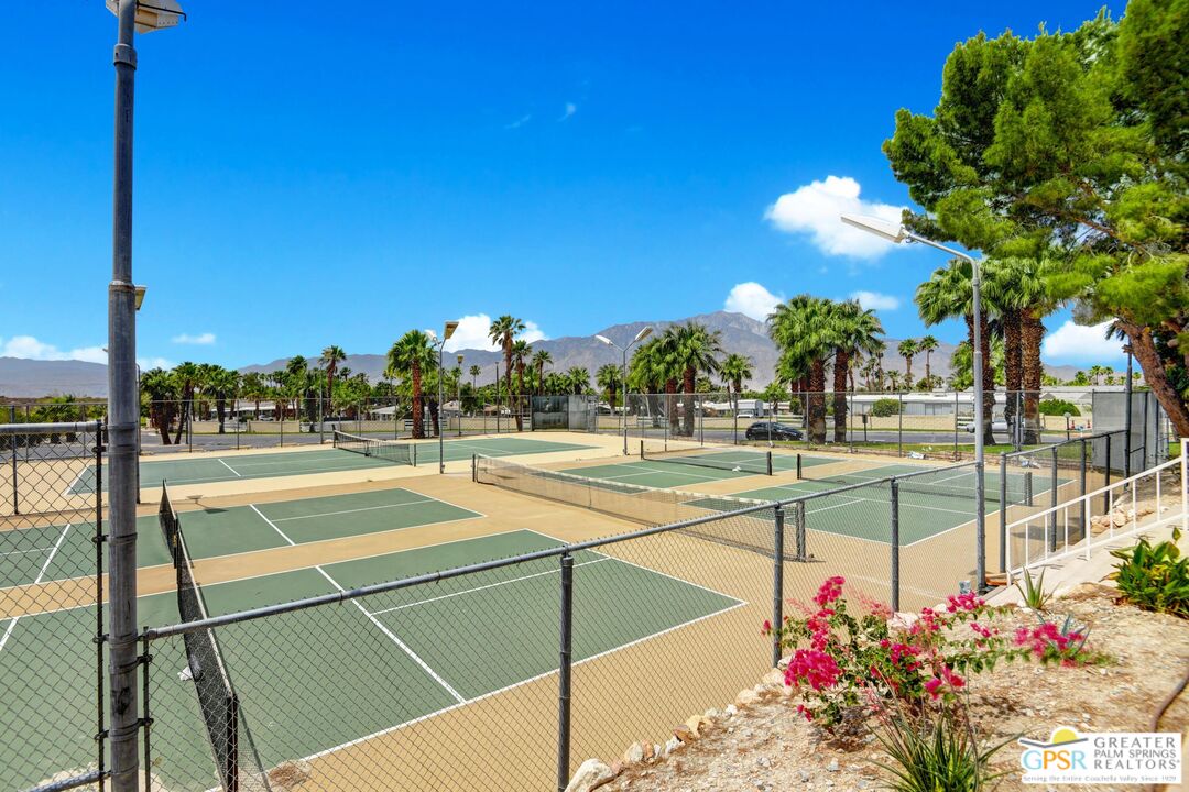 15500 Bubbling Wells Road, Unit 286 Desert Hot Springs, CA 92240 - Photo 45 of 50 a view of a swimming pool with a patio