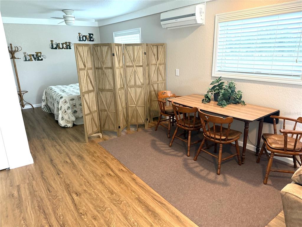 1470 Nestor Court North Port, FL 34286 - Photo 4 of 13 a dining room with furniture and window