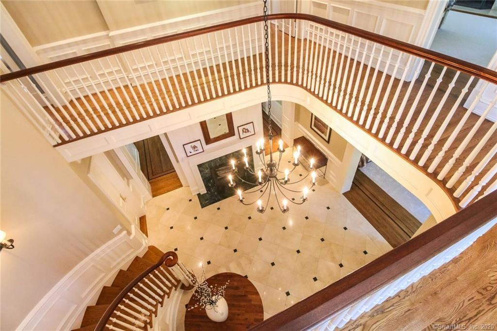 83 Lukes Wood Road New Canaan, CT 06840 - Photo 3 of 51 a view of a wooden floor