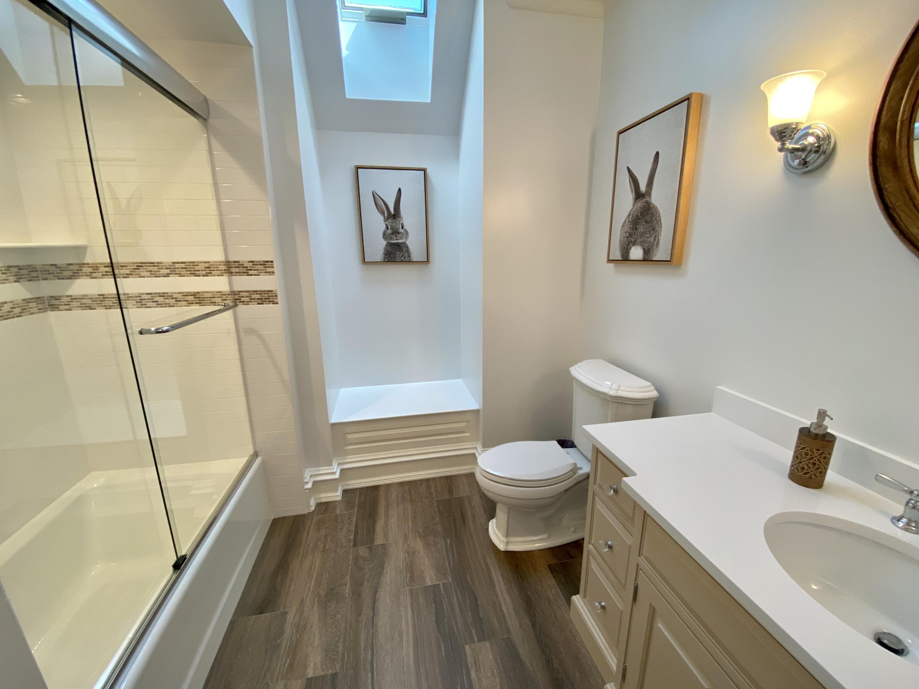 83 Lukes Wood Road New Canaan, CT 06840 - Photo 21 of 51 a bathroom with a sink and a toilet