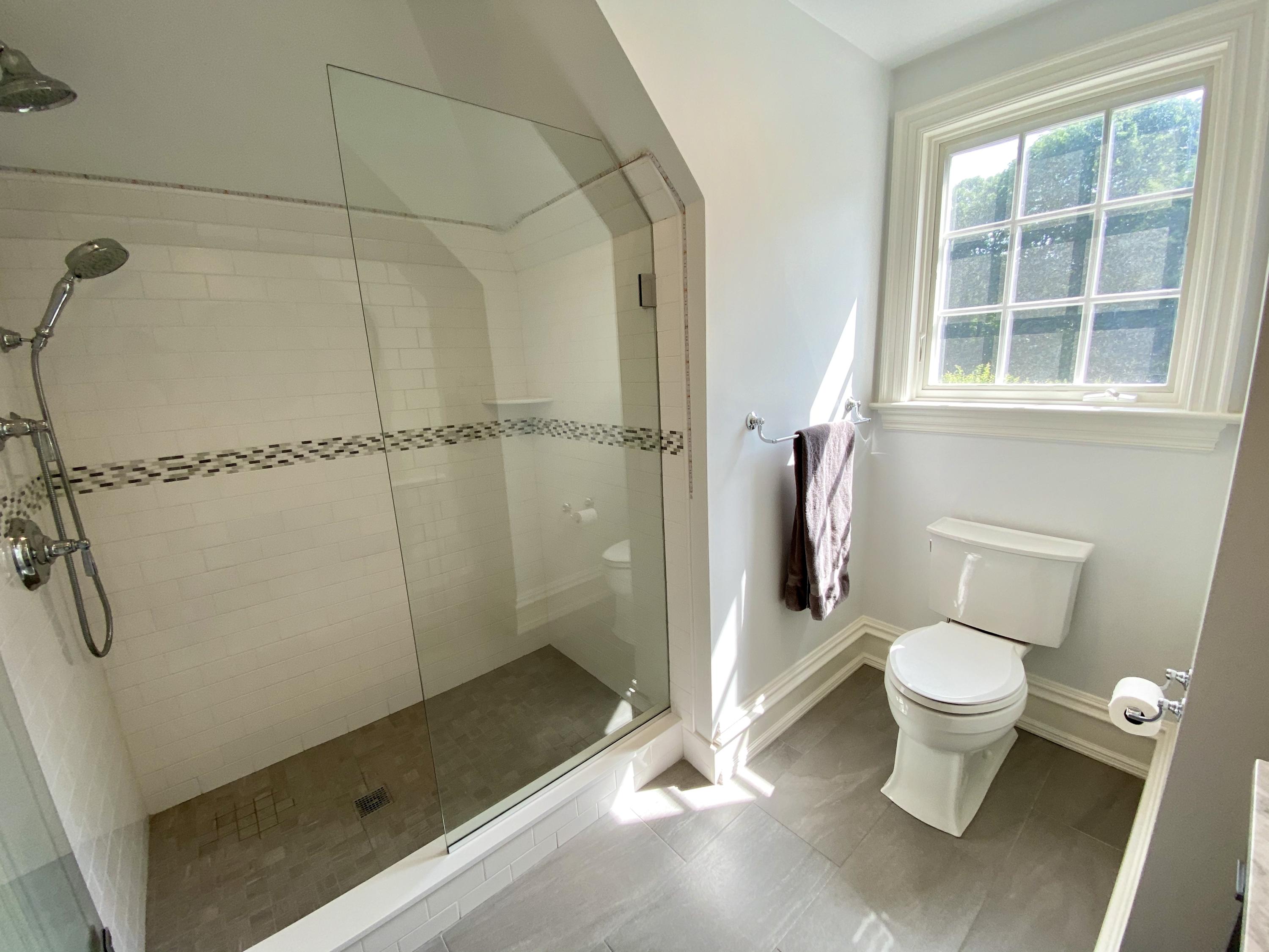 83 Lukes Wood Road New Canaan, CT 06840 - Photo 23 of 51 a bathroom with a toilet and a shower