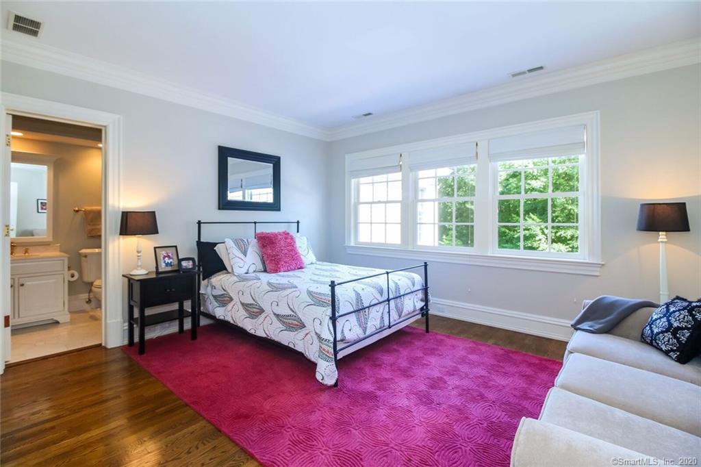 83 Lukes Wood Road New Canaan, CT 06840 - Photo 25 of 51 a bedroom with a bed and window
