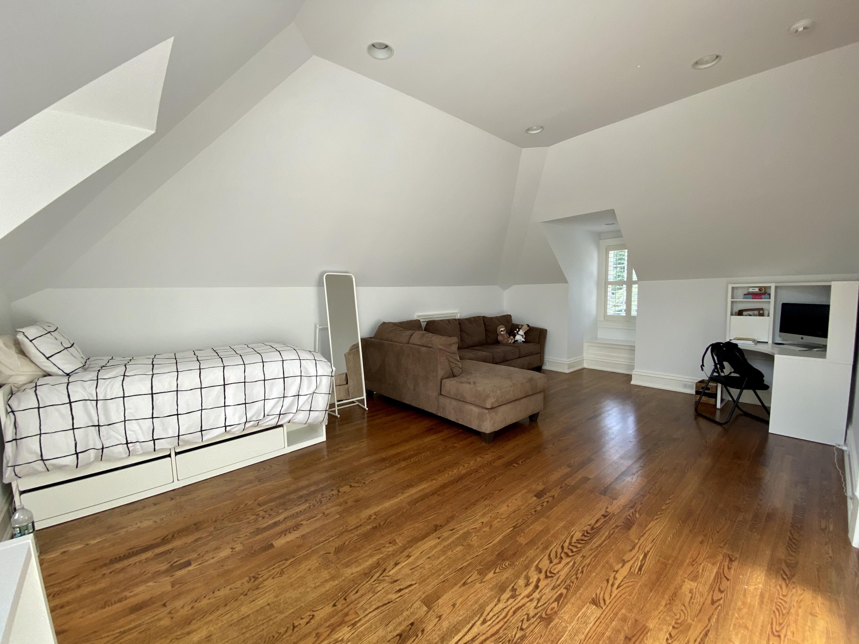 83 Lukes Wood Road New Canaan, CT 06840 - Photo 30 of 51 a living room with furniture and a wooden floor
