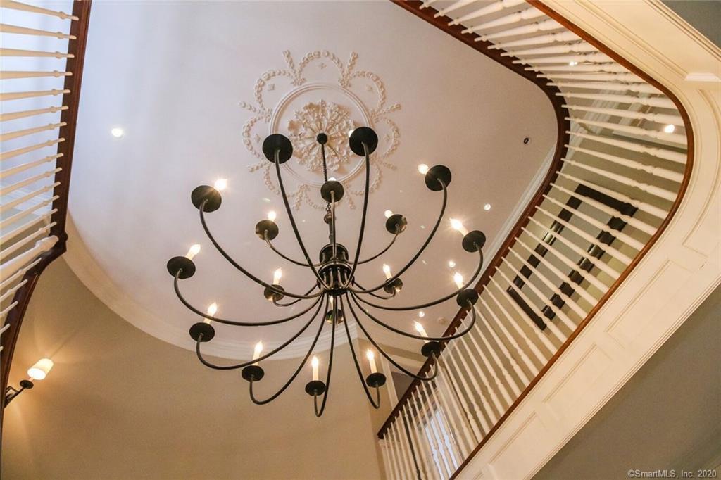 83 Lukes Wood Road New Canaan, CT 06840 - Photo 4 of 51 a picture of a room with wooden floor