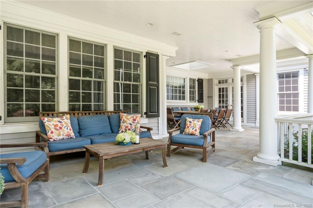 83 Lukes Wood Road New Canaan, CT 06840 - Photo 36 of 51 a outdoor living space with furniture and a couch