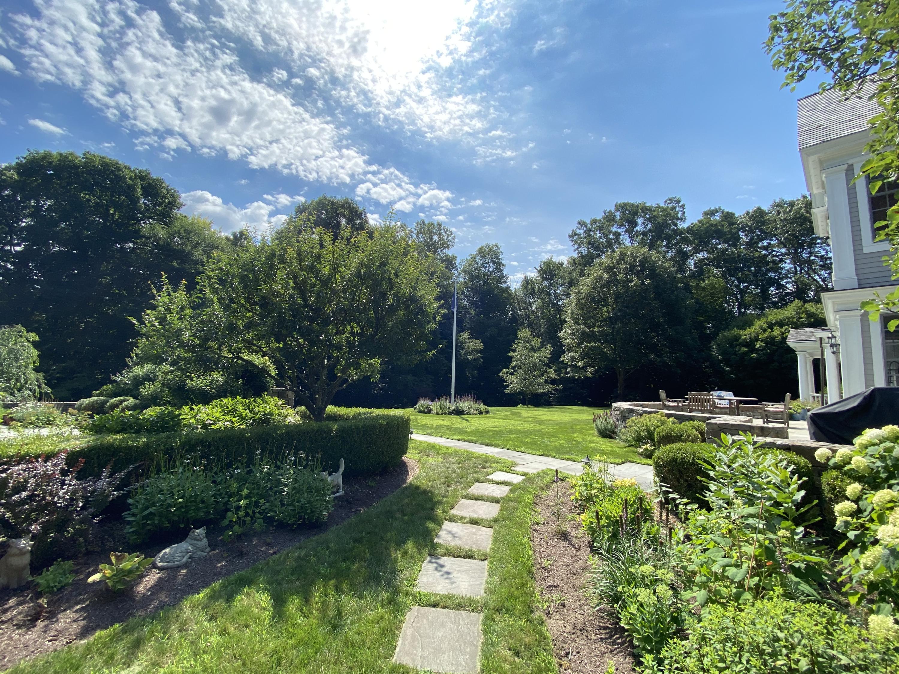 83 Lukes Wood Road New Canaan, CT 06840 - Photo 40 of 51 a view of a park with large trees