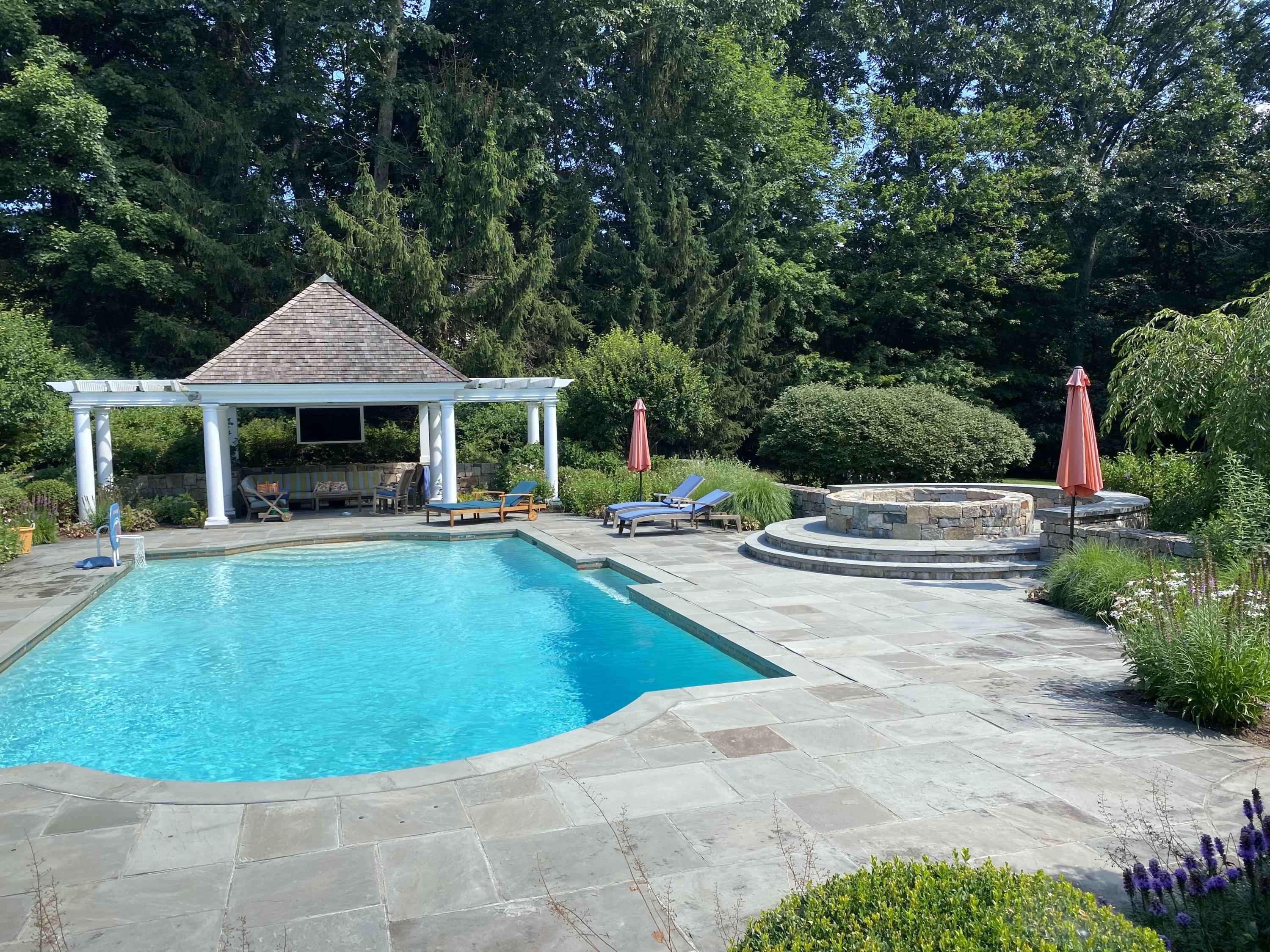 83 Lukes Wood Road New Canaan, CT 06840 - Photo 42 of 51 a view of a house with swimming pool and porch