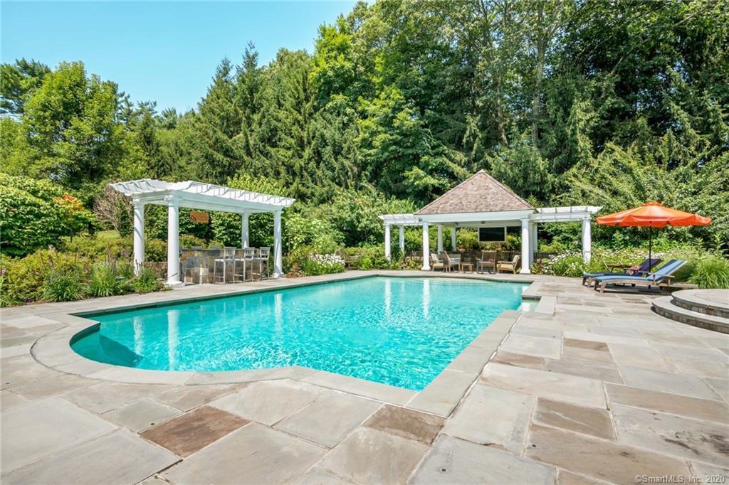 83 Lukes Wood Road New Canaan, CT 06840 - Photo 48 of 51 a view of pool with a garden