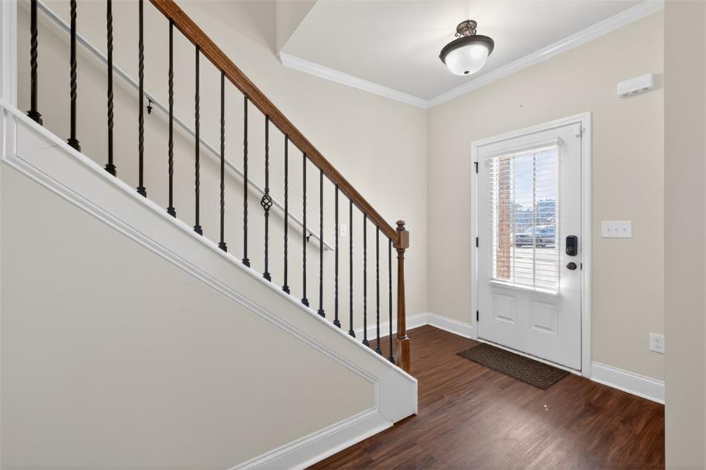 860 Tranquil Way Hampton, GA 30228 - Photo 3 of 54 a view of an entryway with wooden floor