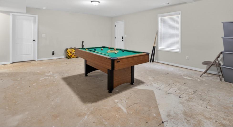 860 Tranquil Way Hampton, GA 30228 - Photo 42 of 54 a room with table and window