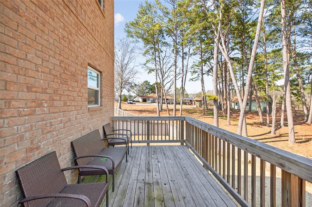 860 Tranquil Way Hampton, GA 30228 - Photo 45 of 54 a view of a two chairs in the balcony