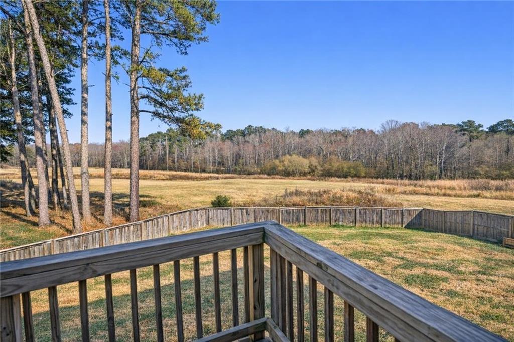 860 Tranquil Way Hampton, GA 30228 - Photo 47 of 54 a view of a swimming pool with a patio and a yard