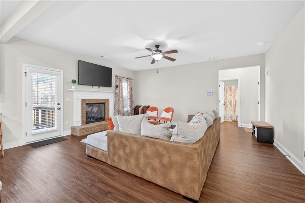 860 Tranquil Way Hampton, GA 30228 - Photo 6 of 54 a living room with furniture fireplace and a flat screen tv