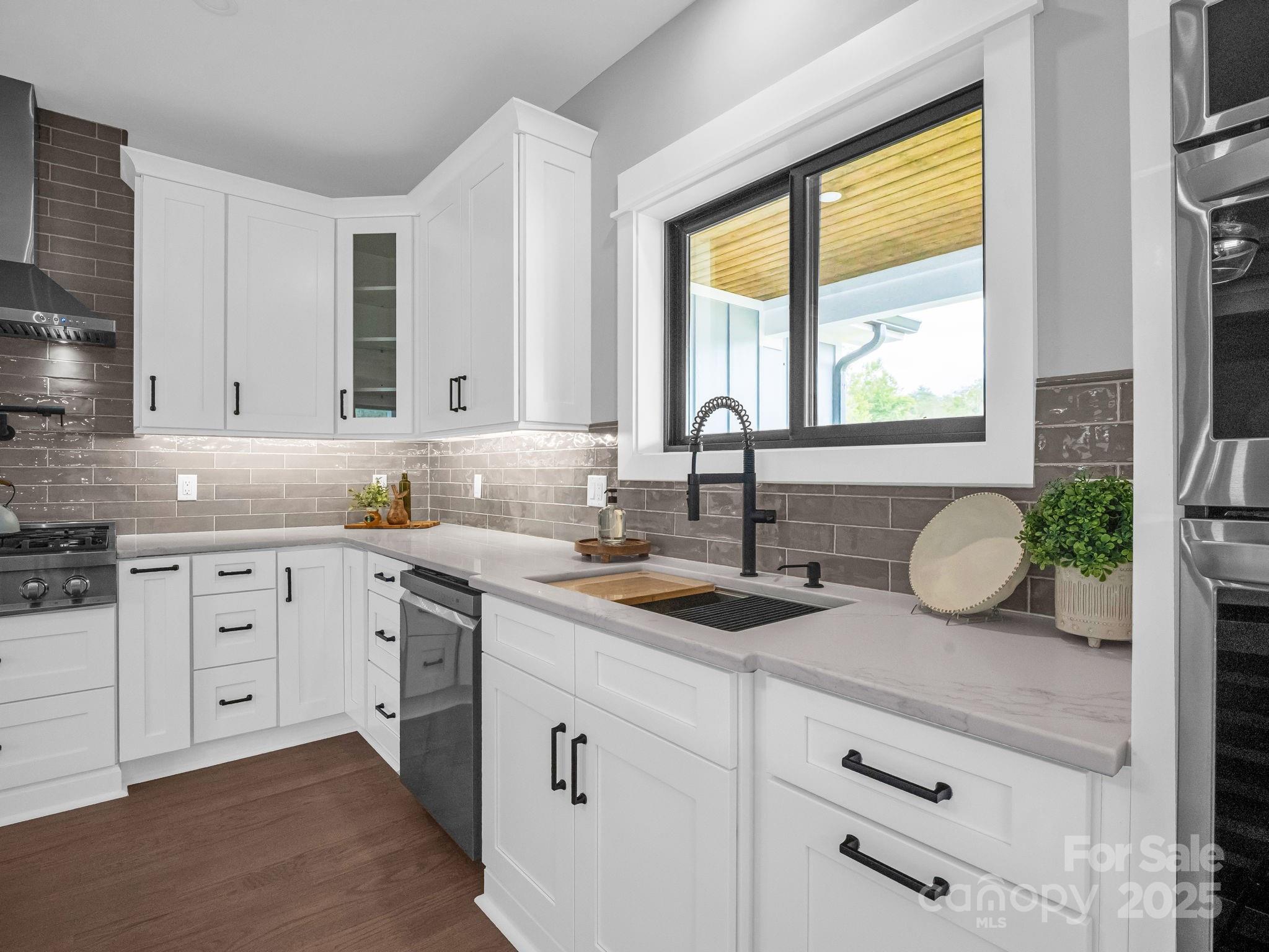128 Gravely Branch Road Fletcher, NC 28732 - Photo 13 of 48 a kitchen with sink and window