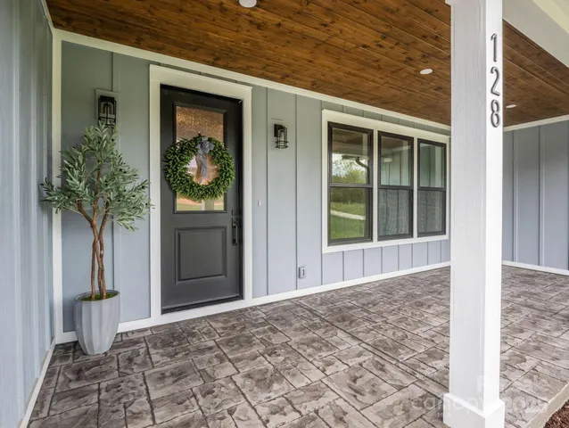 a view of a porch of a house