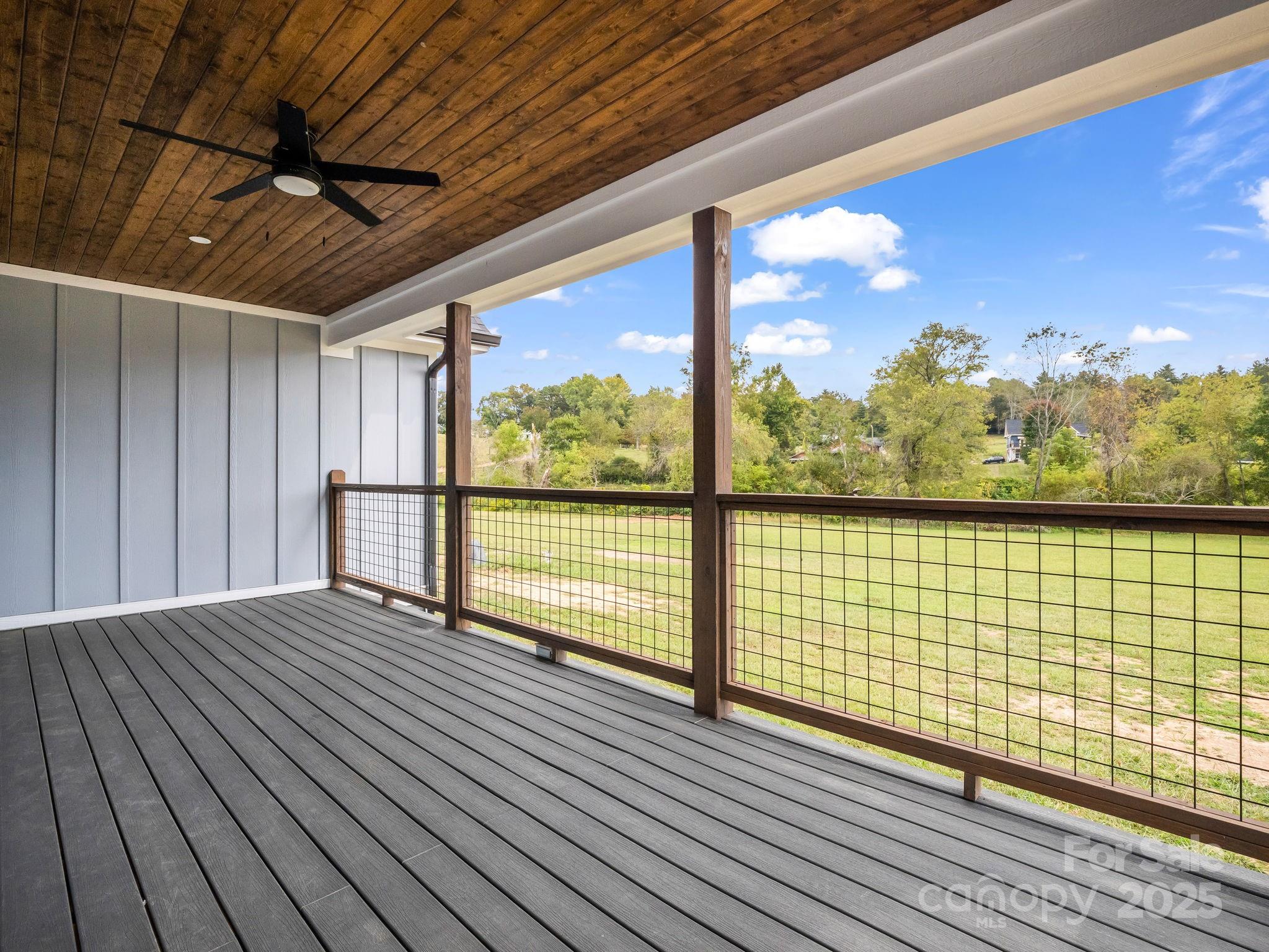 128 Gravely Branch Road Fletcher, NC 28732 - Photo 23 of 48 a view of balcony with wooden floor