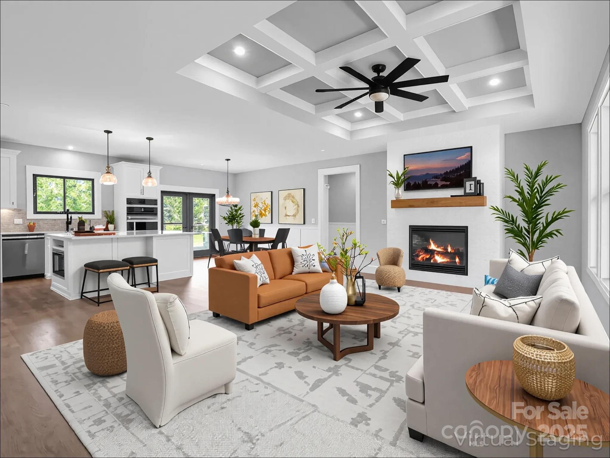 128 Gravely Branch Road Fletcher, NC 28732 - Photo 3 of 48 a living room with furniture a fireplace and a ceiling fan