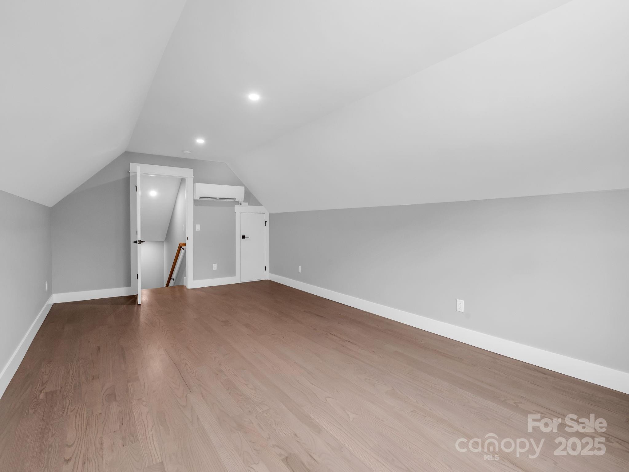 128 Gravely Branch Road Fletcher, NC 28732 - Photo 35 of 48 a view of an empty room with wooden floor
