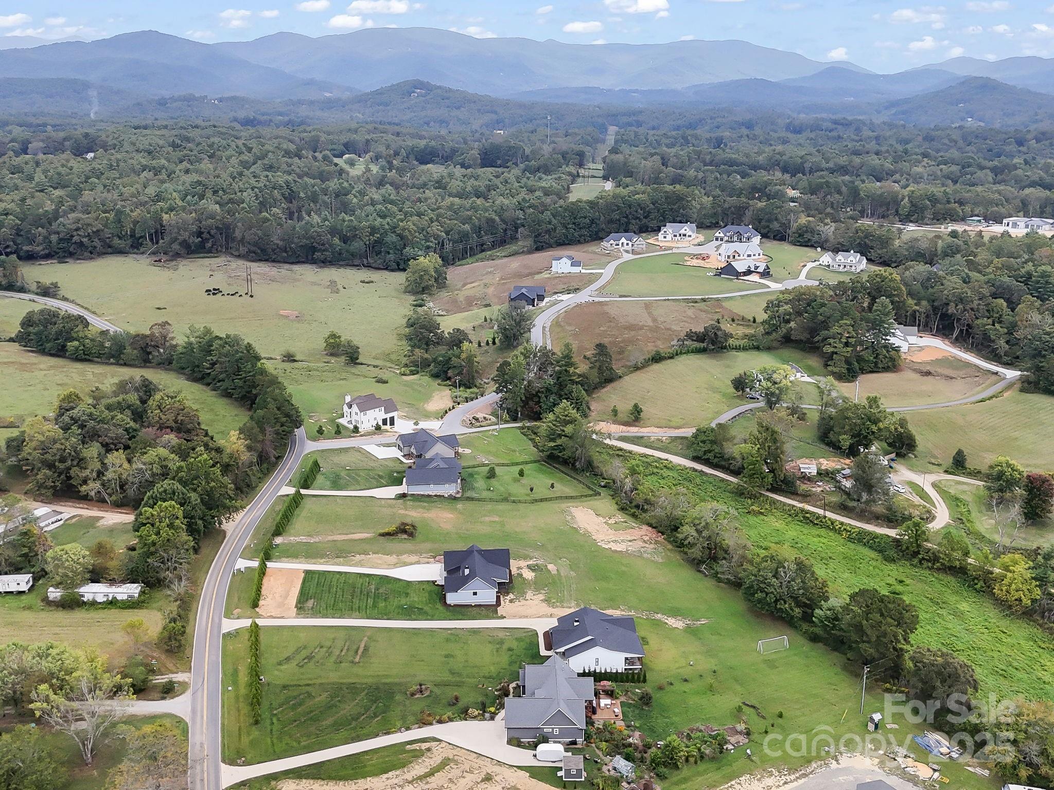 128 Gravely Branch Road Fletcher, NC 28732 - Photo 41 of 48 a view of a city with mountains