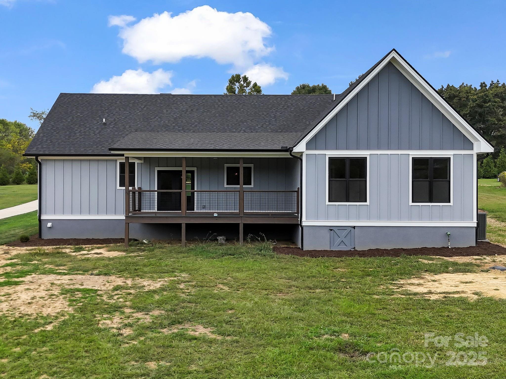 128 Gravely Branch Road Fletcher, NC 28732 - Photo 44 of 48 a view of a house with a yard