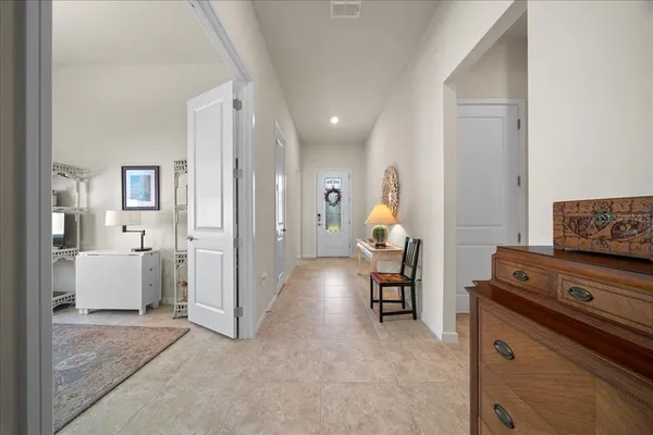 a view of a livingroom with a furniture and a flat screen tv