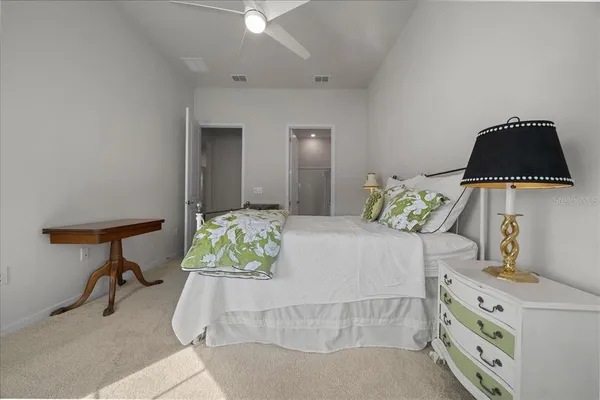 a bathroom with a toilet and shower