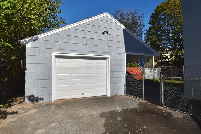a front view of a house with a garage