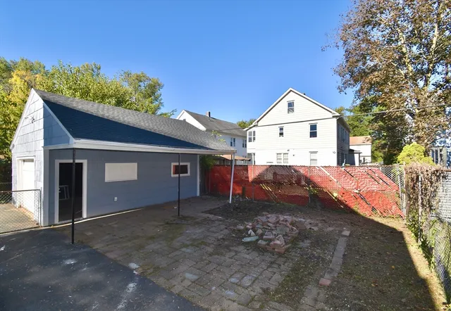 a house view with a backyard space