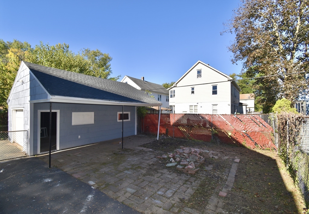 46-48 Wait Street Springfield, MA 01104 - Photo 6 of 40 a house view with a backyard space