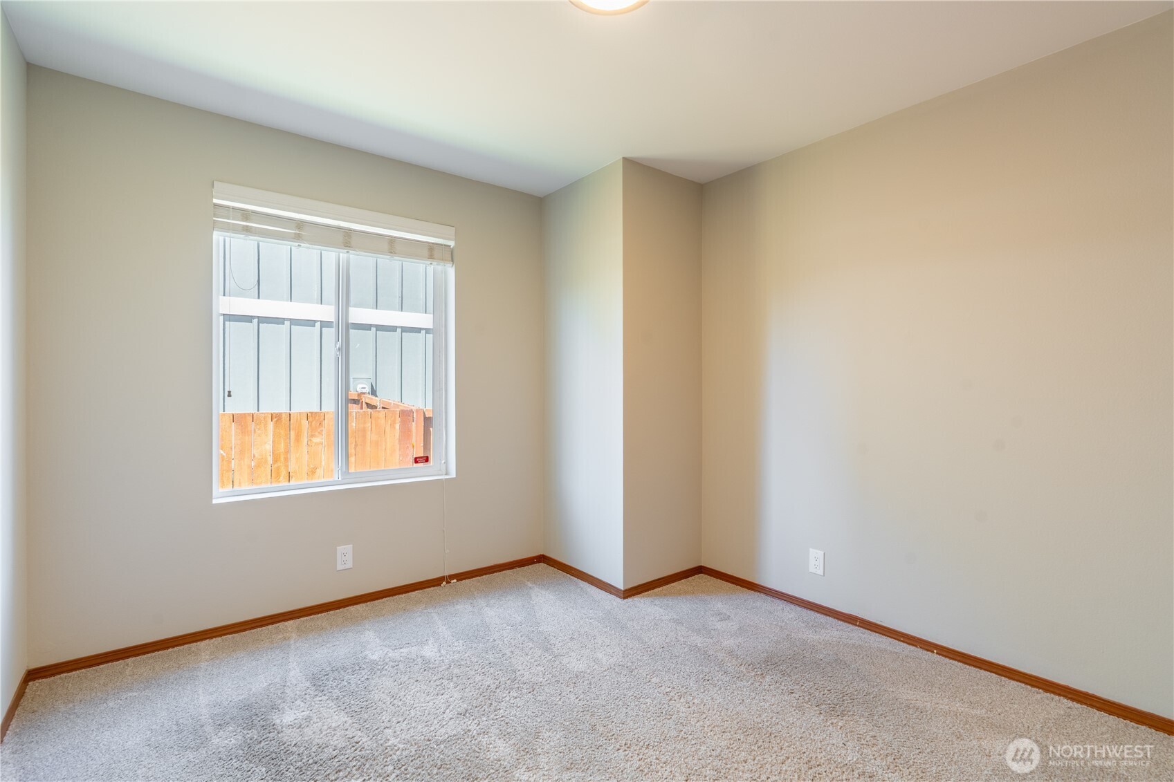 242 Riggs Drive East Enumclaw, WA 98022 - Photo 17 of 40 an empty room with a window