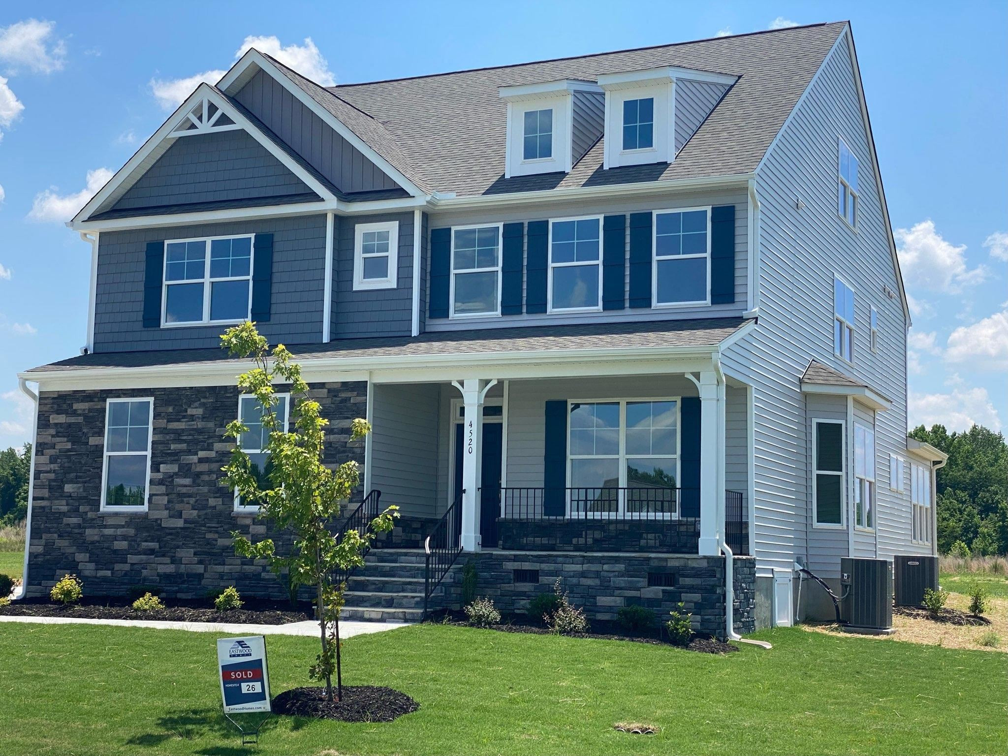 4520 Beckel Road Willow Spring, NC 27592 - Photo 1 of 3 a front view of a house with a yard