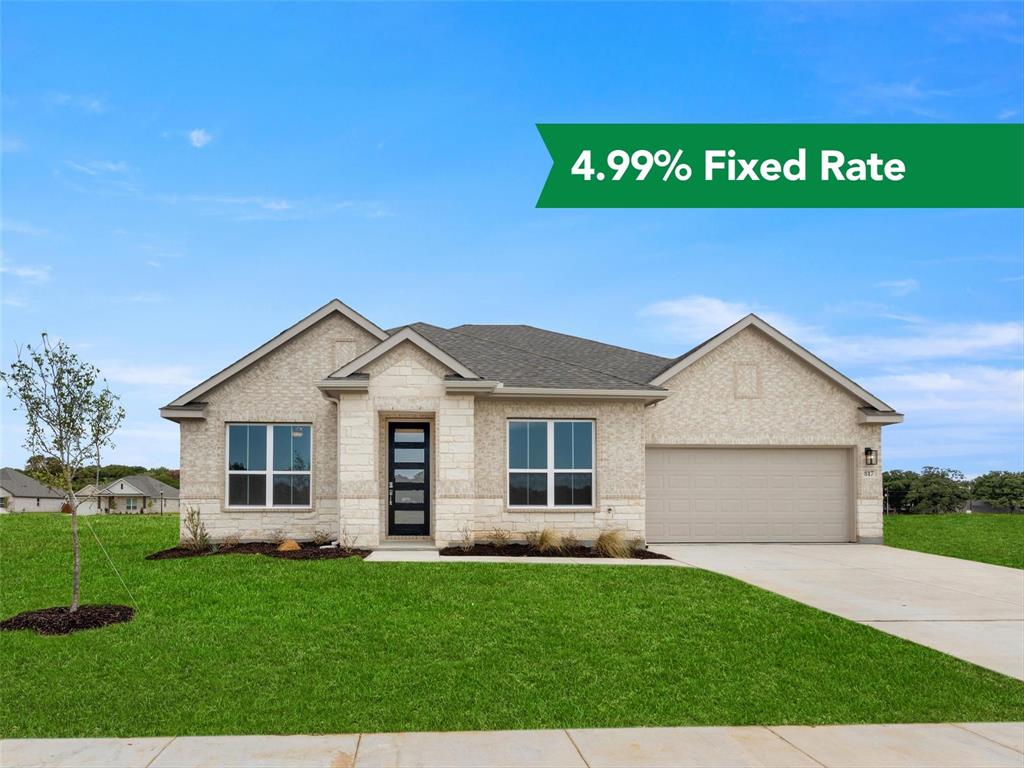 817 Stone Eagle Drive Azle, TX 76020 - Photo 1 of 1 a house with green field in front of it