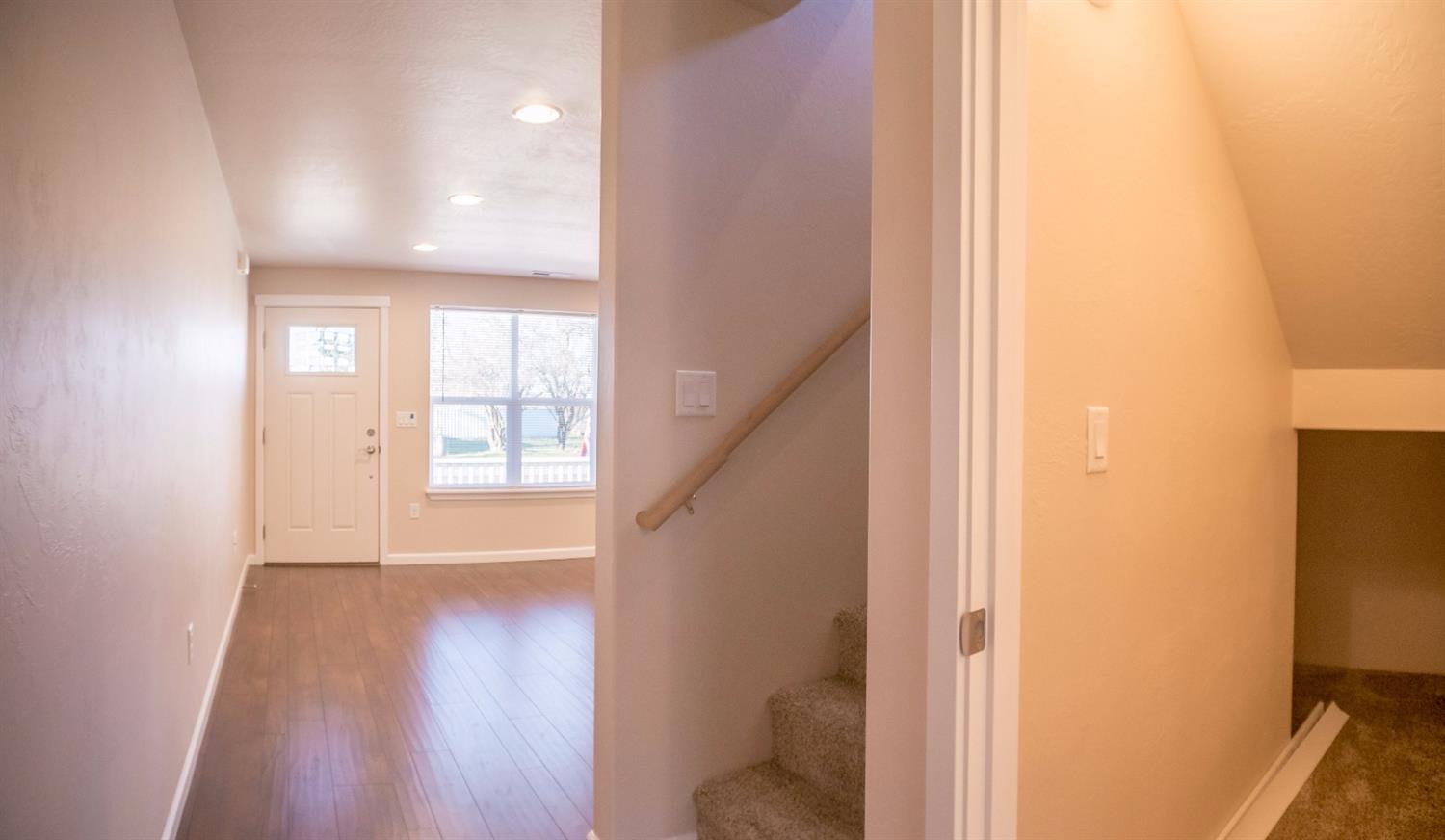 240 Maple Street Central Point, OR 97502 - Photo 3 of 35 a view of an entryway with wooden floor