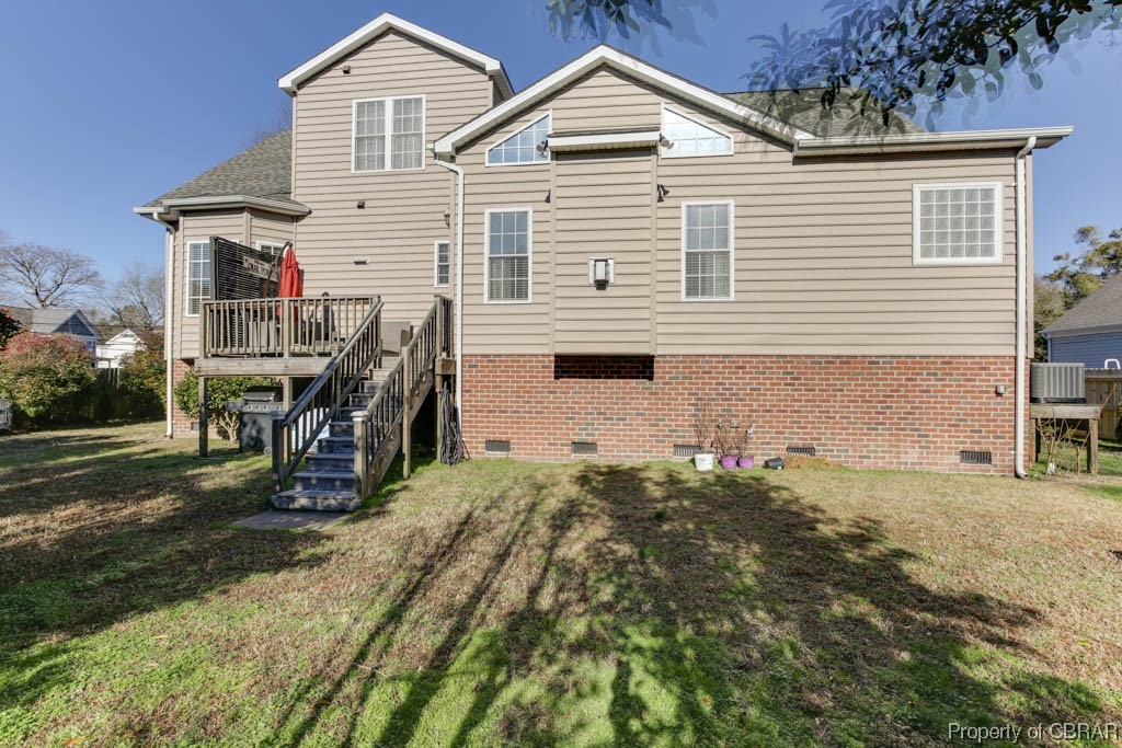 4 Willow Road Hampton, VA 23664 - Photo 47 of 48 Back of house featuring a yard, a wooden deck, and central AC unit