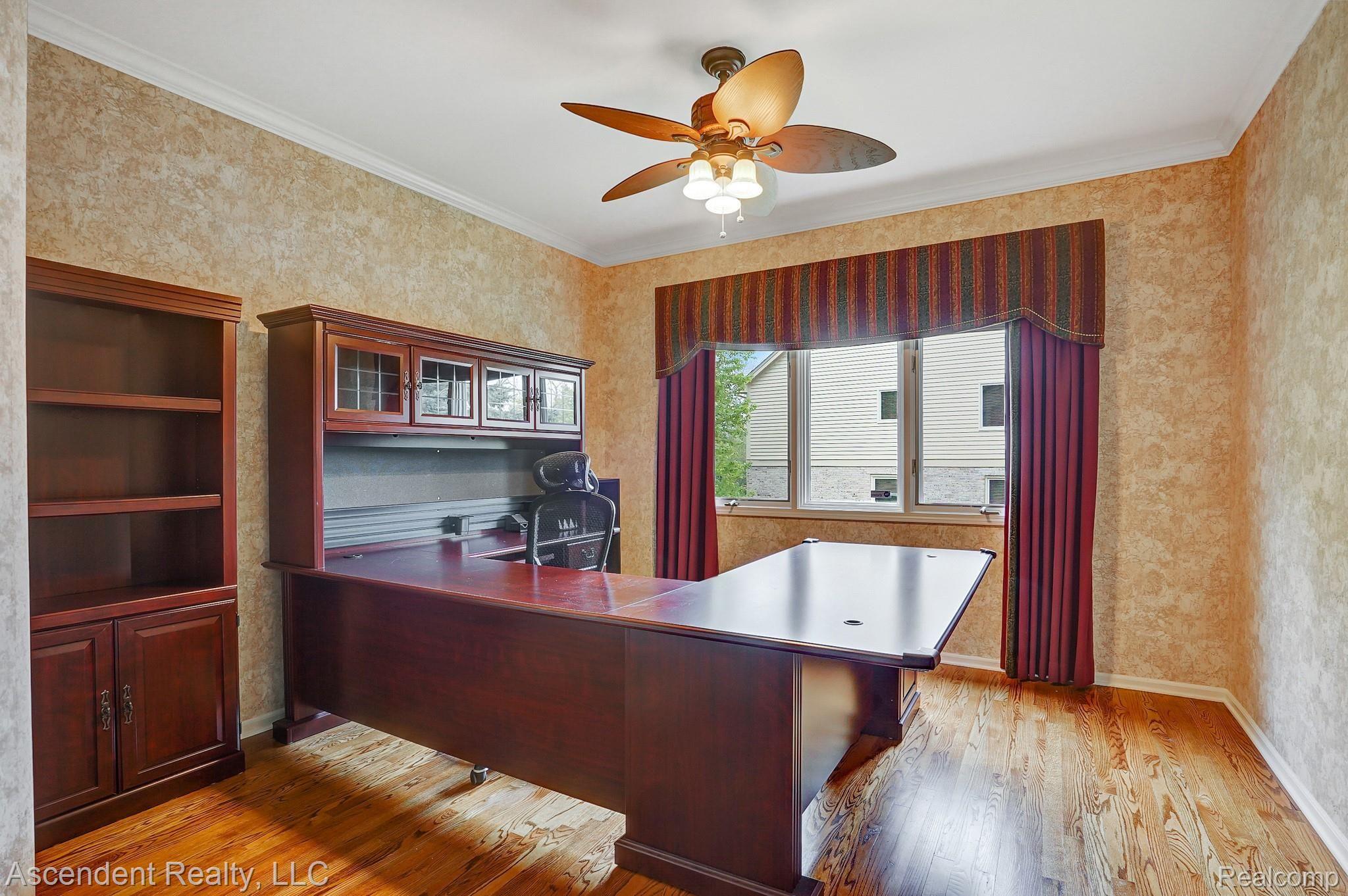 4080 Plum Lane Rochester, MI 48306 - Photo 9 of 45 Study with wood flooring, and build in desk.jpg