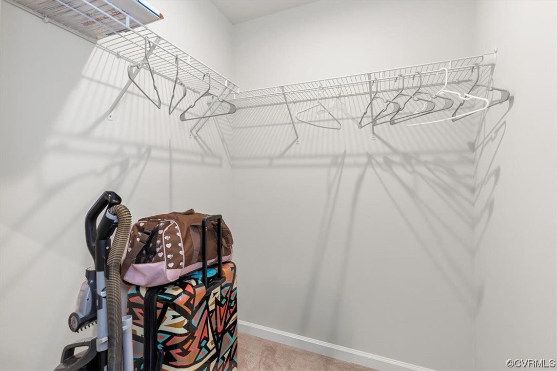 8443 Evening Star Place Richmond, VA 23235 - Photo 12 of 33 a view of a room with rack on the wall