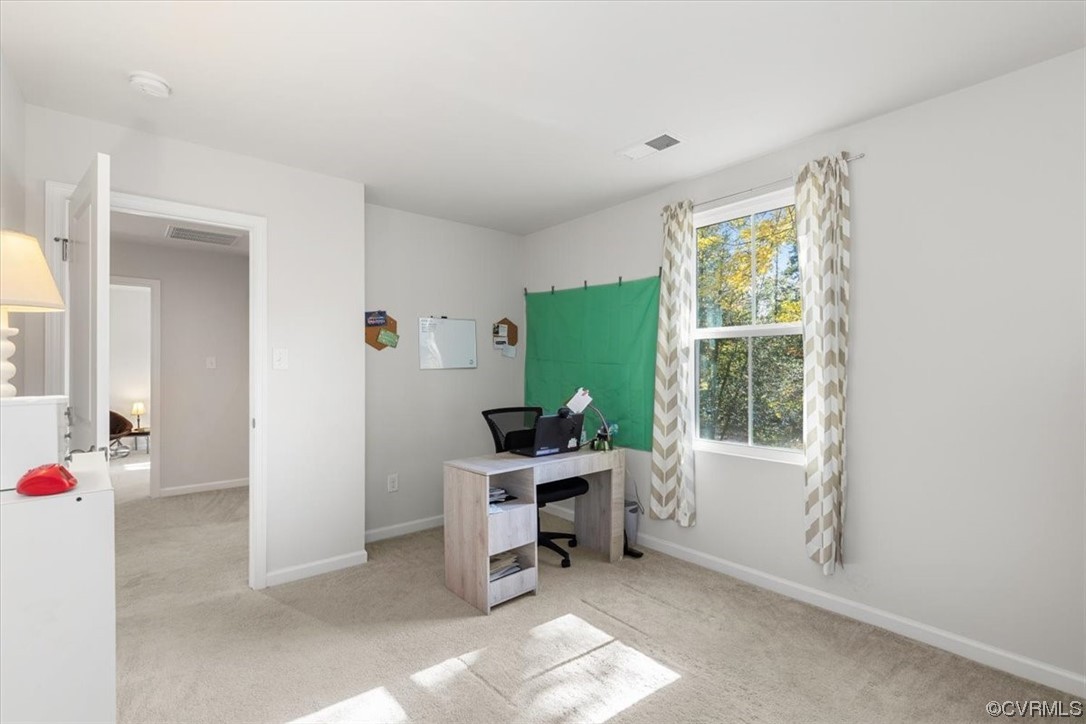 8443 Evening Star Place Richmond, VA 23235 - Photo 15 of 33 a workspace with furniture and window