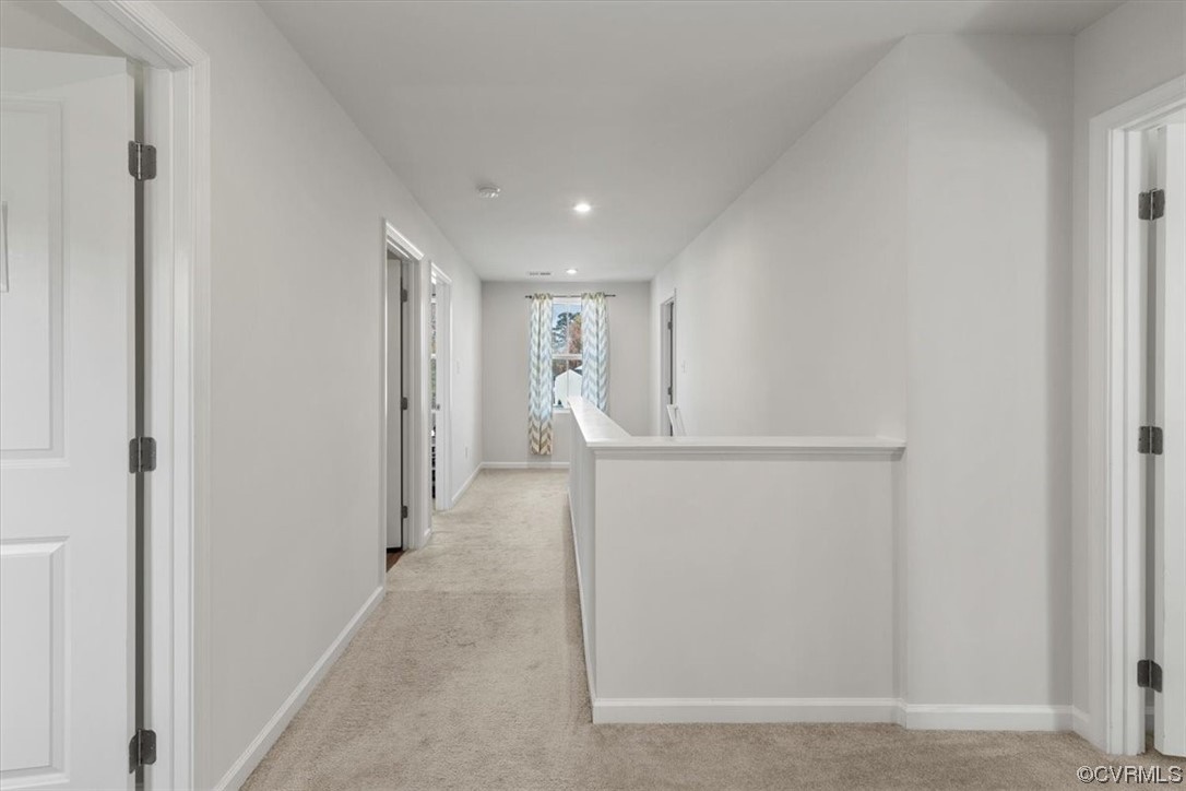 8443 Evening Star Place Richmond, VA 23235 - Photo 10 of 33 a view of hallway with an empty space