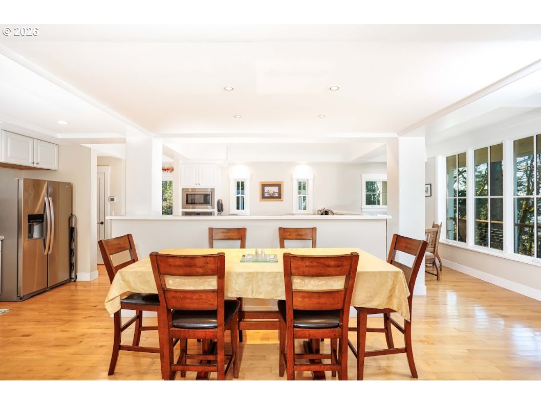 787 South Sunset Lane Ridgefield, WA 98642 - Photo 14 of 43 a dining room with furniture and wooden floor
